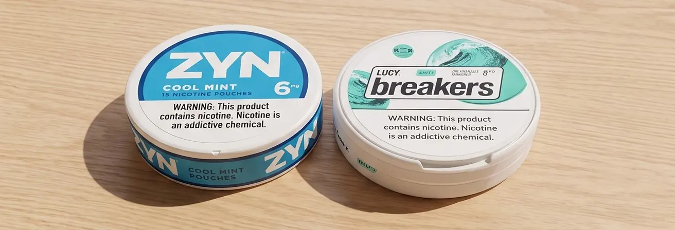 A can of ZYN Cool Mint 6mg next to a can of LUCY Breakers on a wood table