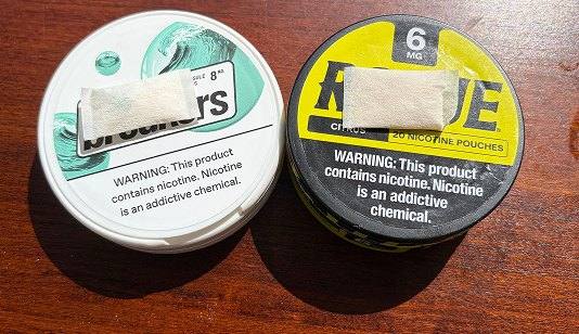 LUCY Breakers and Rogue pouches resting on their closed cans